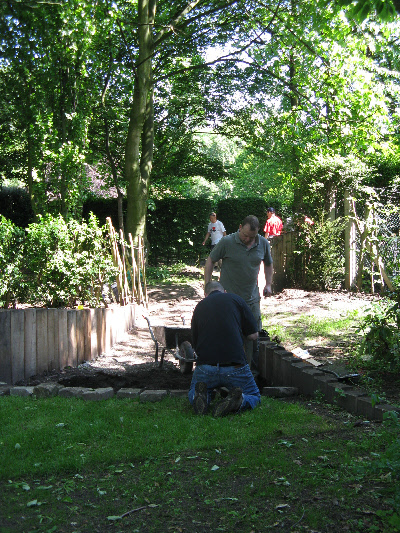 volunteers laying edging